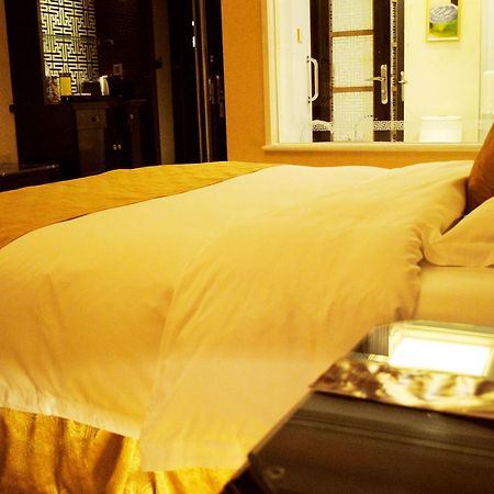 Datong Weidu International Hotel Quarto foto