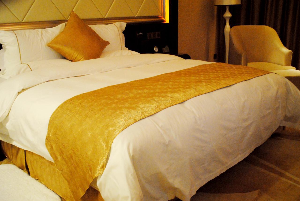 Datong Weidu International Hotel Quarto foto